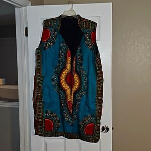 Sleeveless African coat with pockets. OS